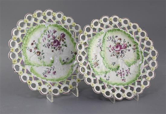 A pair of Derby leaf moulded spectacle plates, c.1758, d. 18cm, firing faults